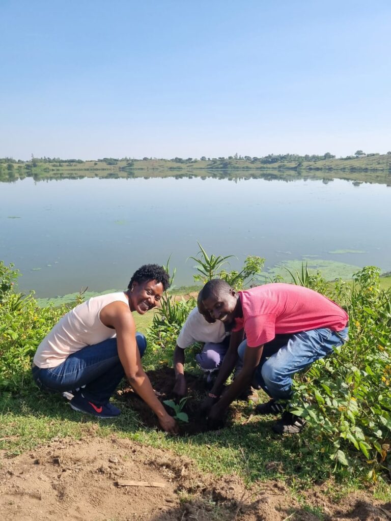 Group planting trees near Lake Simbi Nyaima